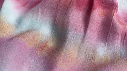 Close-Up of Colorful Tie-Dye Fabric Texture