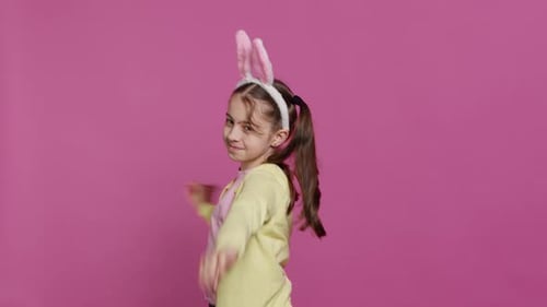 Confident Cheery Girl Showing Dance Moves in the Studio