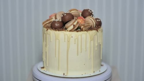 Close Up of Drip Cake Decorated with Sweets