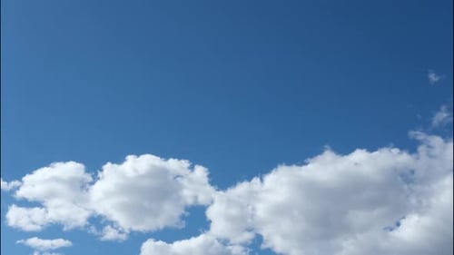 Blue Sky with White Clouds and Drifting Clouds