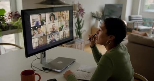 Woman Attending Online Meeting at Home