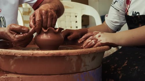 Shaping A Clay Pot In A Ceramics Workshop 53