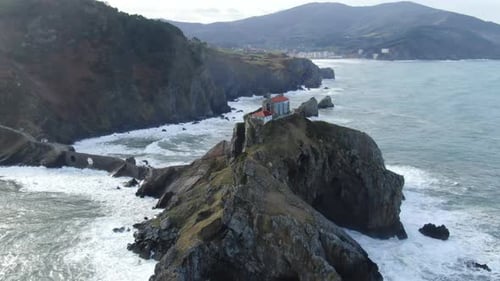 Drone orbit shot Gaztelugache is an islet in the Vizcaya town of Bermeo, Pais Vasco, Spain.