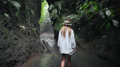 Carefree Blonde Woman in Straw Hat Admire View Mountain Waterfall in Wild Nature Girl Tourist in