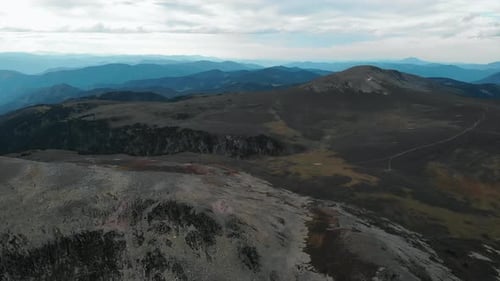 Aerial View Flying Over Rocky Mountain Range Landscape Media