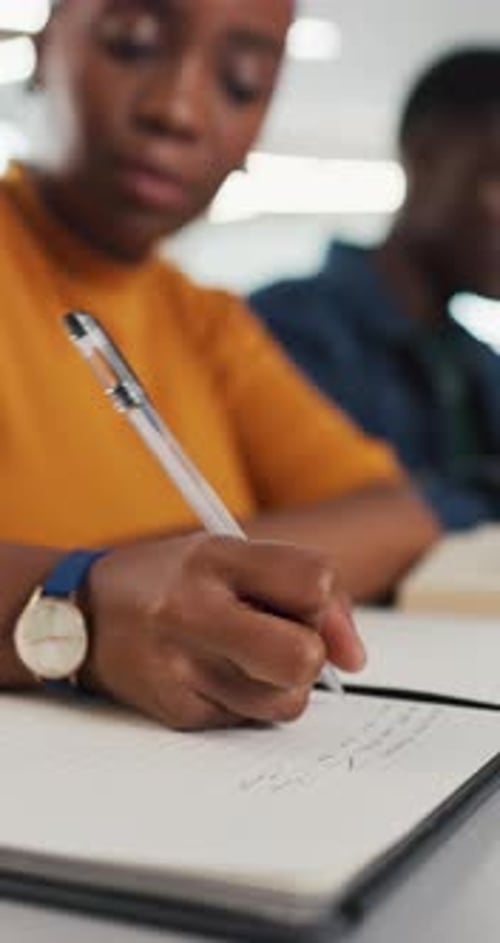 Notebook, hands and woman in classroom for writing, studying or assignment at university