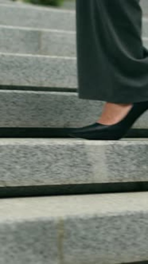 Unrecognizable Stylish African American Business Woman Walking Upstairs in City Cropped View Female
