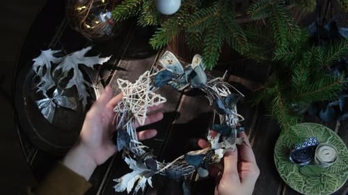 Assembling Christmas Wreath on a Table