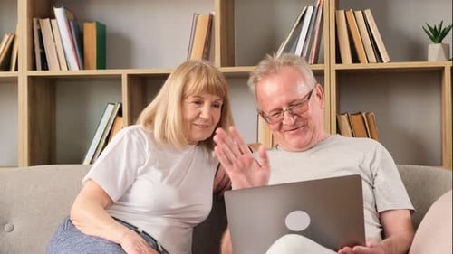Mature Couple Using Laptop Together at Home