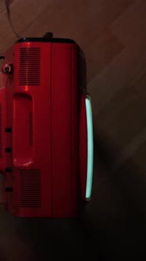 Red Television Set with Neon Green Screen