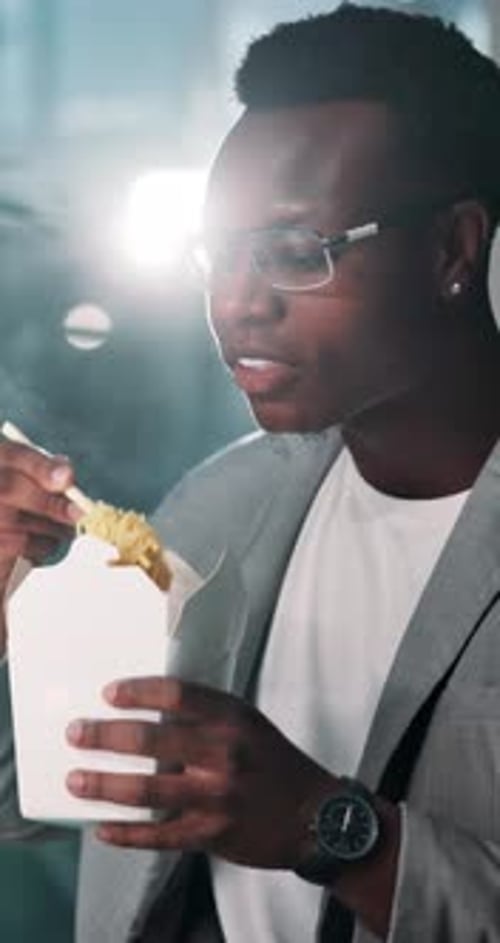 Businessman, night or eating with noodles for lunch break, rest or meal time at office