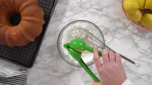 Preparing Lemon Cake Glaze in Bright Kitchen
