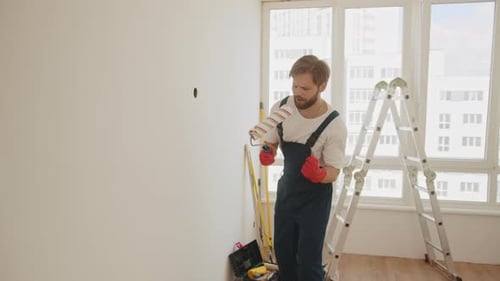 Close Up of Cheerful Caucasian Funny Man Listening Song in Headphones Dancing