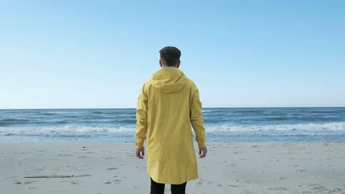 One Young Trendy Hiker Guy Stand Alone, Look at Waterline and Enjoy