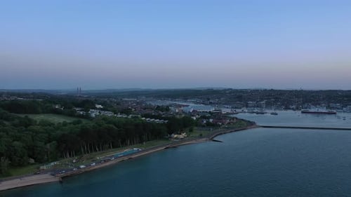 Aerial shot of a coastal town on the Isle of Wight, on a clear calm spring day.