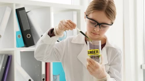 School Girl in Chemistry Class