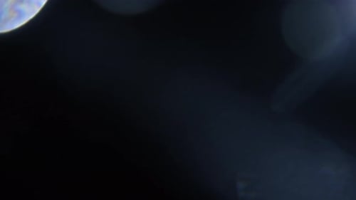Cinematic Bokeh Light Leak Overlay on Black Background