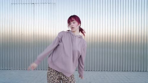 Young Urban Dancer Performing Energetic Street Dance Routine