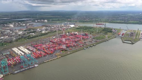 Port of Antwerp industrial shipping hub with vessels and containers, Belgium