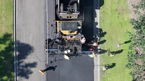 Asphalt Paving Work By Professional Road Construction Team
