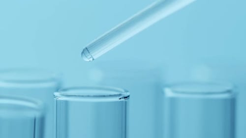Pipette Drip Drops Into Laboratory Test Glass Tubes Nobody Blue Tone