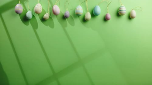 Eggs on Green Background and Copy Space