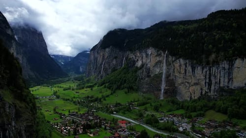 4k Drone Aerial Straight Shot Of Famous Staubbach Waterfall In Lauterbrunnen Village With Impressive