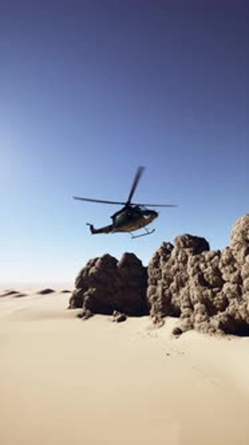 Helicopter Flying Over Desert Rocks