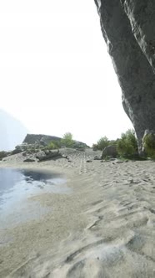 A Scenic Beach with a Breathtaking View of a Cliff and the Ocean