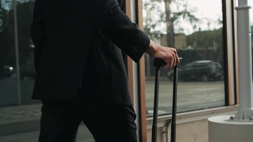 Tourist Man with Suitcase Baggage in Spain A Traveler with Luggage Suit Jacket on Business Street Go