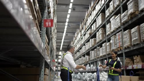 Logistics employees are working warehouse.