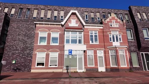 Close up of restored red brick facade with white detailing in Coevorden Drenthe