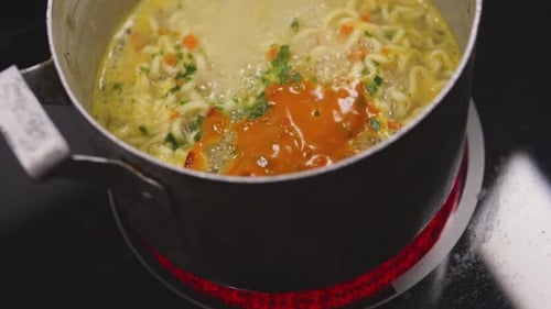 Instant Noodles Boiling in a Saucepan Asian Food Fast Food Close Up