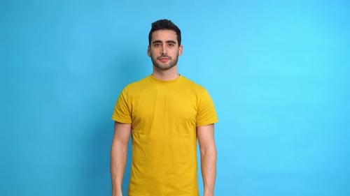 Smiling Man Points to the Right Side