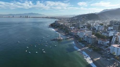 Playa De Los Muertos beach and pier close to famous Puerto Vallarta Malecon, the city largest public