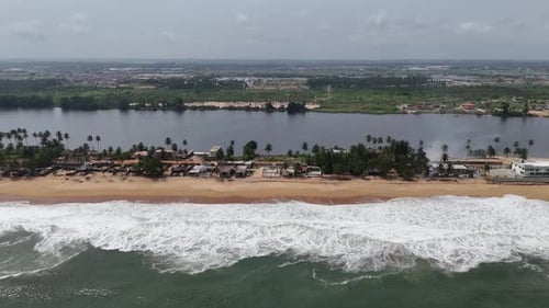 Aerial video over Grand Bassam Ivory Coast, on a sunny day.