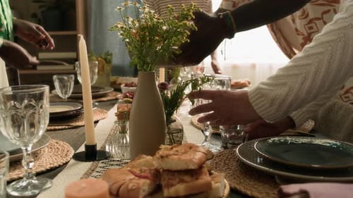 People Gathering around Dining Table for Celebration
