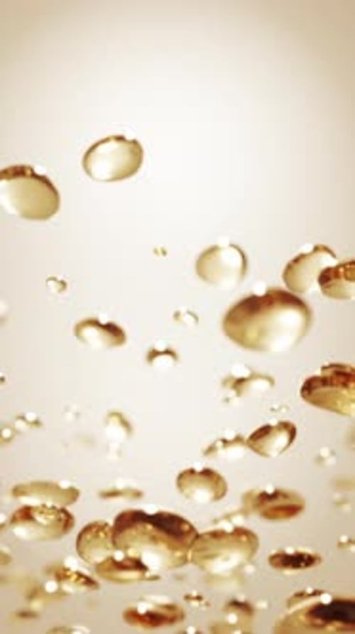 Abstract Golden Bubbles Rising Fluid Motion Background