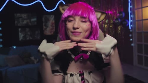 Young Woman in Costume Posing with Pink Hair