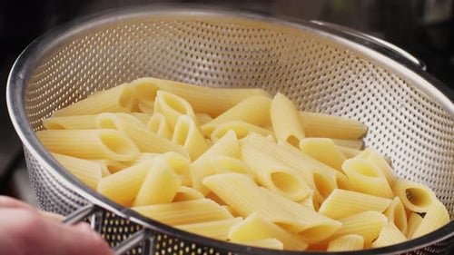 Background Texture of Raw Italian Pasta Penne Penne Rigate Top View Closeup