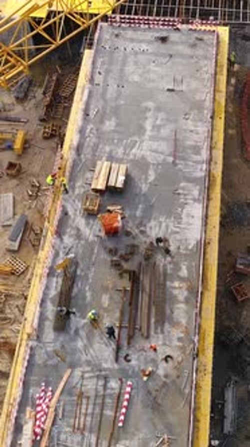 Vertical Video of Construction with Cranes