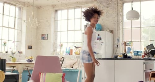 4k video footage of a young woman dancing at home