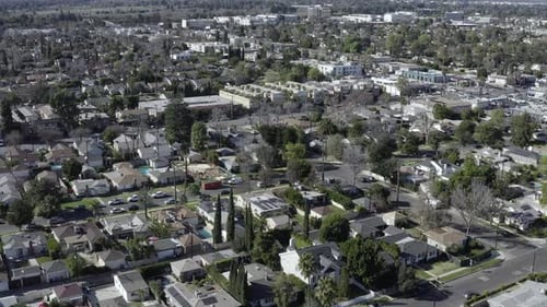 Aerial View of Suburban Neighborhood to Urban Transition