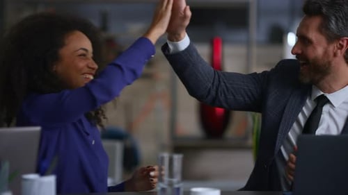 Business Partners Clapping Hands High Five on Multi Racial Conference Meeting. Diverse