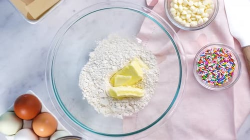 Making cookies with butter and brown sugar