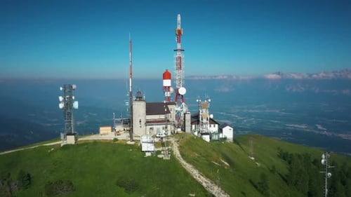 Telecommunication antenna complex on top of a sunny mountain - Orbit, Aerial