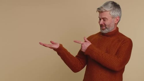 Man Pointing Empty Place Advertising Area for Commercial Text Copy Space for Goods Promotion