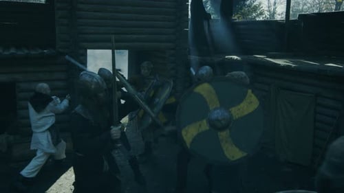 Battle Reenactment with Warriors in Helmets and Armor