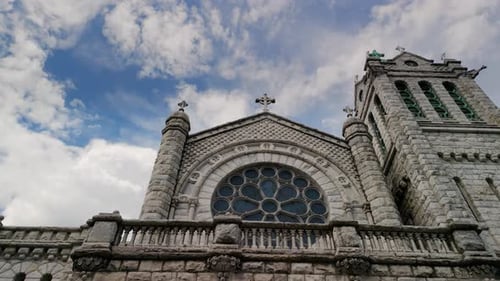 Aerial Shot of Elements Church Steeple Christianity with Clouds on Blue Sky