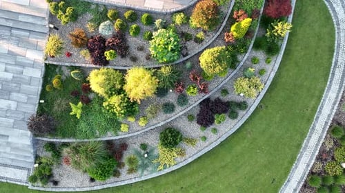 Aerial View of Building With Spiral Staircase Rockery Garden